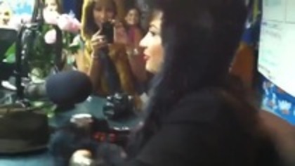 Demi on Kiss FM rocking her new hat (41)