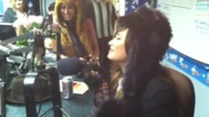 Demi on Kiss FM rocking her new hat (101)