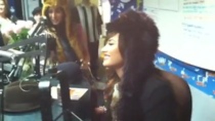 Demi on Kiss FM rocking her new hat (102)