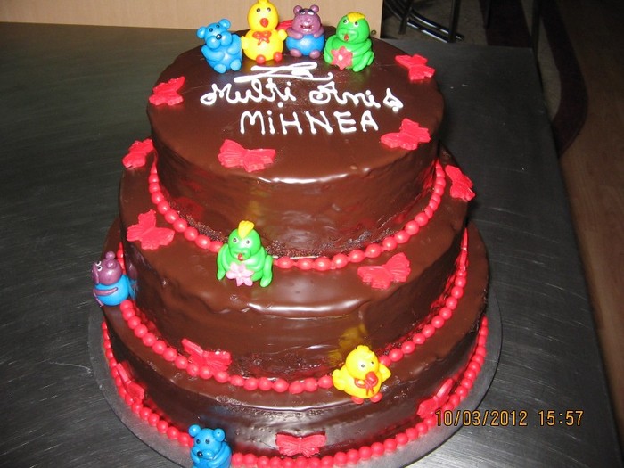 Tort botez cu figurine comestibile