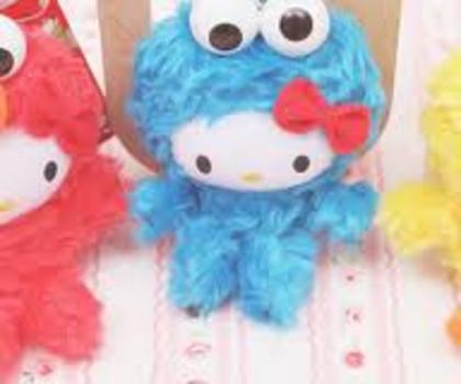 images (1) - Hello Kitty deghizata in Cookie Monster