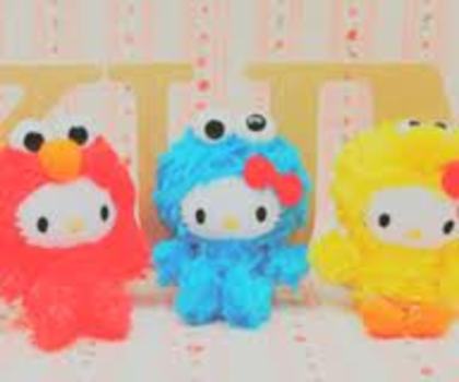 images - Hello Kitty deghizata in Cookie Monster