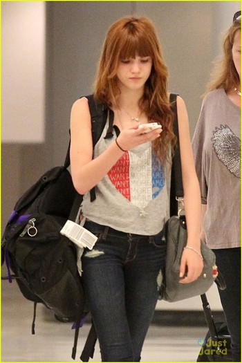 bella-thorne-miami-arrival-04 - Bella Thorne Danimals Shoot in Miami