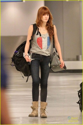 bella-thorne-miami-arrival-05 - Bella Thorne Danimals Shoot in Miami