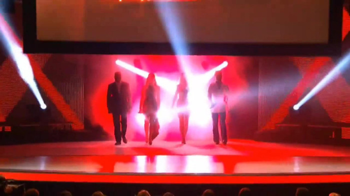 Demi Lovato joins X Factor USA judges on stage 05000