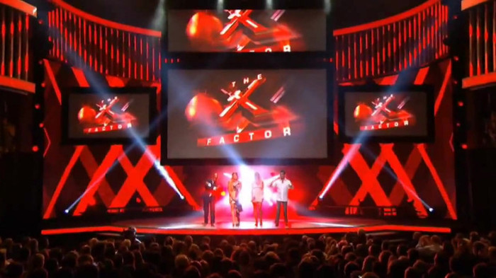 Demi Lovato joins X Factor USA judges on stage 07000