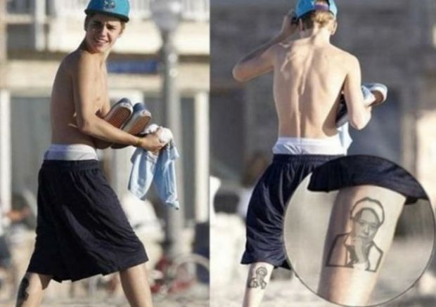 ca-sa-para-un-dur-justin-bieber-si-a-facut-un-tatuaj-cu-fuego-foto_size1 - Justin Bieber si-a facut un tatuaj cu Fuego ca sa para mai dur FOTO
