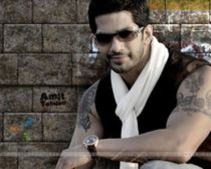 15 - amit tandon