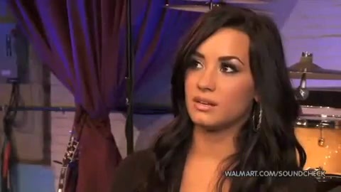 Demi Lovato & Jonas Brothers - Behind The Scenes (2010 Walmart Soundcheck).mp4 2458