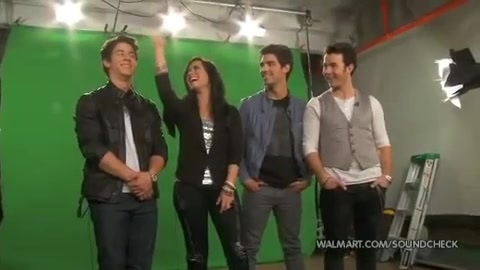 Demi Lovato & Jonas Brothers - Behind The Scenes (2010 Walmart Soundcheck).mp4 3464