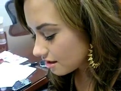 DEMI LOVATO VIP MEETING AT 8-1-10 4774