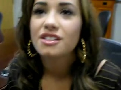 DEMI LOVATO VIP MEETING AT 8-1-10 4924
