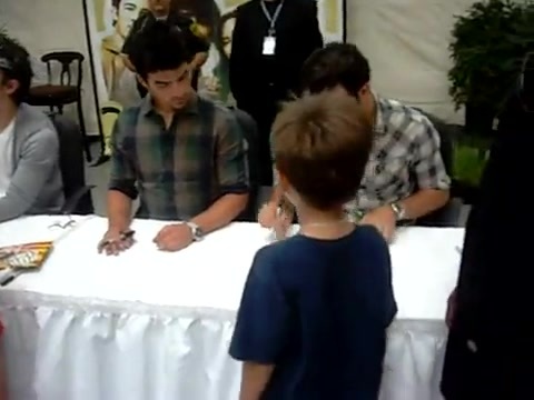 Meeting the Jonas Brothers and Demi Lovato at Walmart 0040