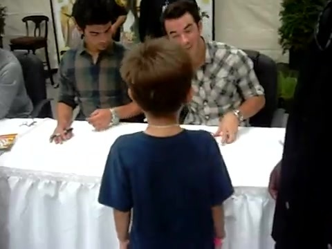 Meeting the Jonas Brothers and Demi Lovato at Walmart 0075