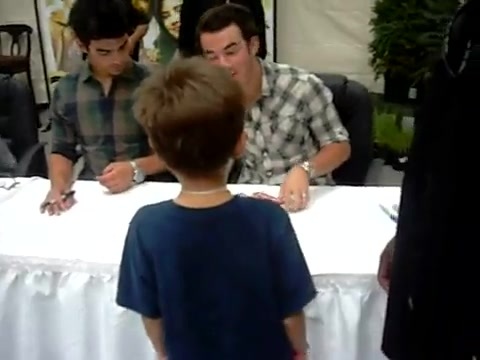 Meeting the Jonas Brothers and Demi Lovato at Walmart 0099