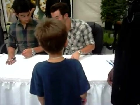 Meeting the Jonas Brothers and Demi Lovato at Walmart 0106