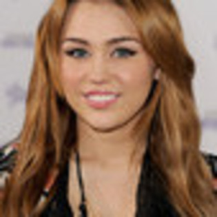 justin-bieber-never-say-never-991412l-thumbnail_gallery - Miley Cyrus