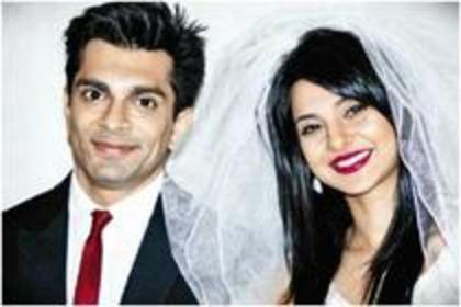 70342848_GYKGPJL - Karan Singh Grover and Jennifer Winget