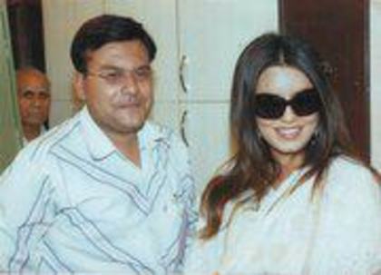 563321_418986278152659_2070893505_n