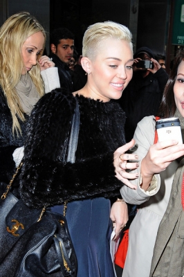 normal_Miley2BCyrus2BMiley2BCyrus2BGreets2BFans2BNYC2BKGUsyrLzPSFl - Out and about in New York city 2012