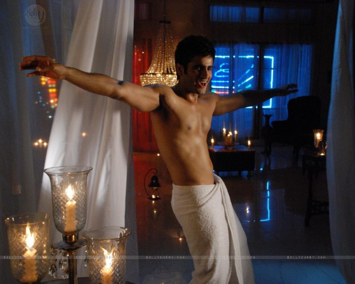 94114-karan-tacker-dances-in-a-white-towel-standing-on-the-edge-of-his - Karan Tacker