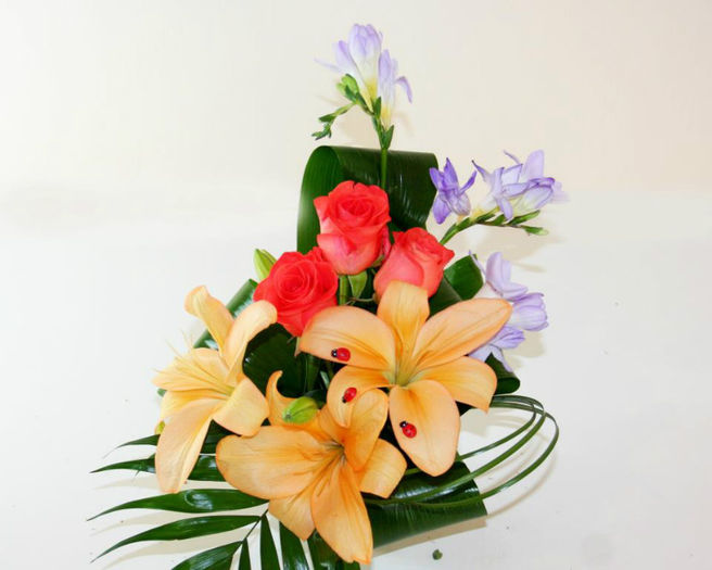 421580_521306557883280_571180065_n - aranjamente florale