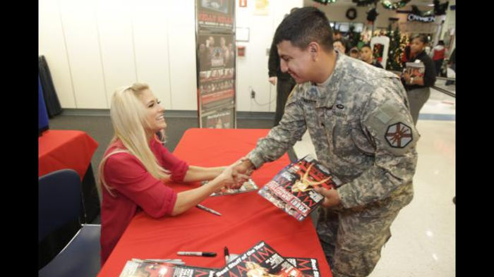 Greet_12102011ca_273 - Kelly Kelly signs her Maxim cover at Fort Bragg