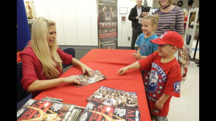 Greet_12102011ca_328 - Kelly Kelly signs her Maxim cover at Fort Bragg