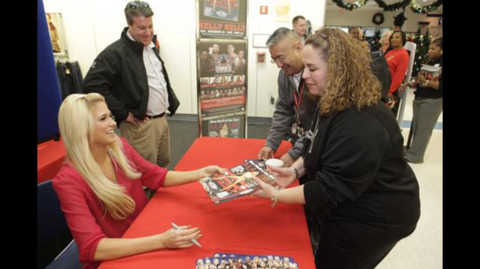Greet_12102011ca_355 - Kelly Kelly signs her Maxim cover at Fort Bragg