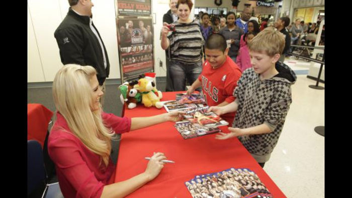 Greet_12102011ca_374 - Kelly Kelly signs her Maxim cover at Fort Bragg