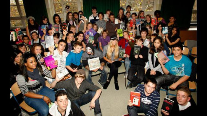 16327886 - Kelly Kelly and Rey Mysterio meet WrestleMania Reading Challenge participants in Cologne Germany