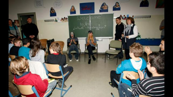 16327994 - Kelly Kelly and Rey Mysterio meet WrestleMania Reading Challenge participants in Cologne Germany