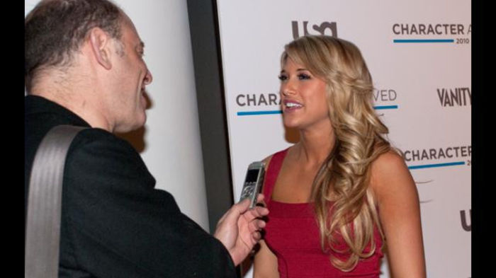 13645828 - Big Show and Kelly Kelly at USA Network New York City red carpet event for the Character Approved Ho