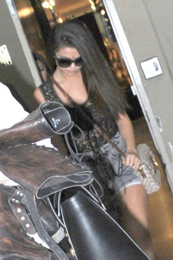 8 - Selena leaving Dolce and Gabbana