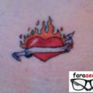 small-tramp-tattoo-111649_wm-150x150