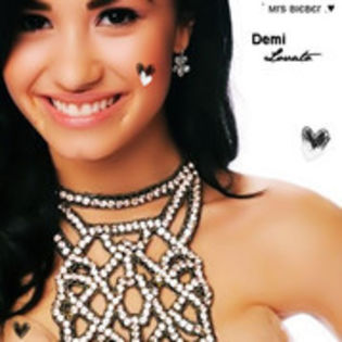 35970490_TXWWYYKCG - 00---Despre Demi Lovato---00