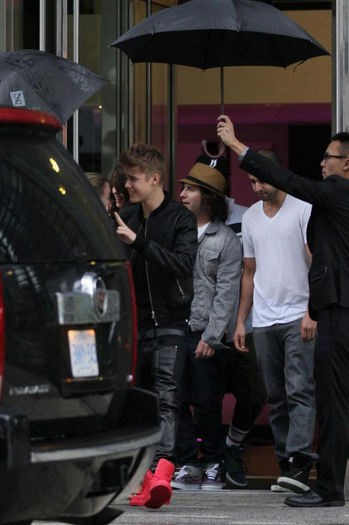 2 - Selena and Justin leaving her hotel in Toronto---09 September 2013