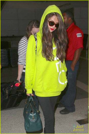 1 - Selena and her stepdad Brian arriving at LAX airport---10 July 2013