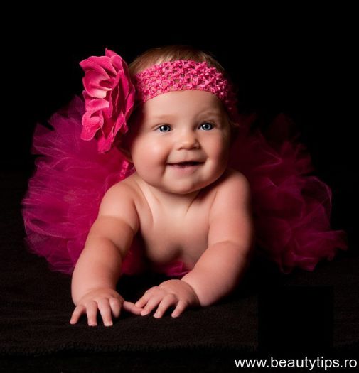 Bentita-cu-floare-roz-pentru-fetite - bebelusi