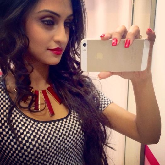 Krystle Dsouza with Iphone