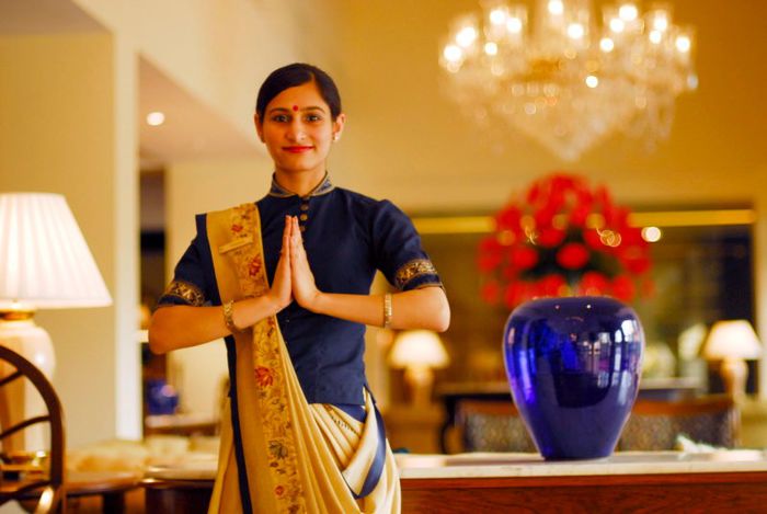 An_Oberoi_Hotel_employee_doing_Namaste,_New_Delhi