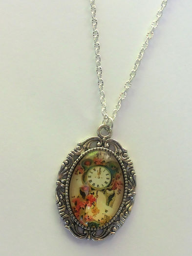 Pandantiv argintiu cu cabochon din sticla - 11 lei