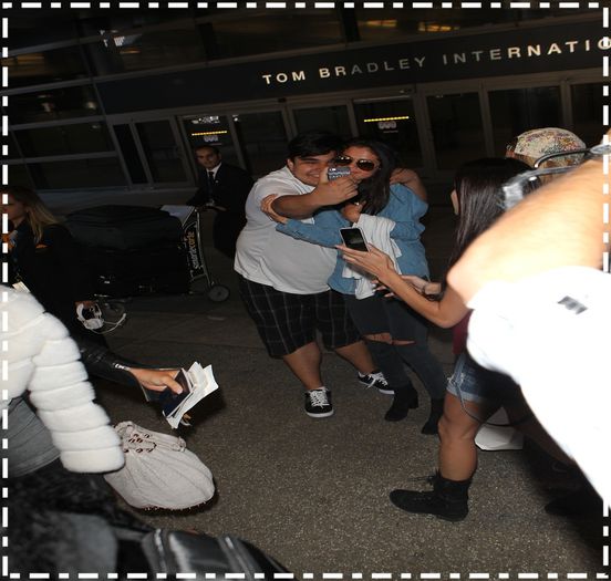  - xz - Arriving -at - LAX - airport - with - Cara -Delevigne -in -Los - A x x x x