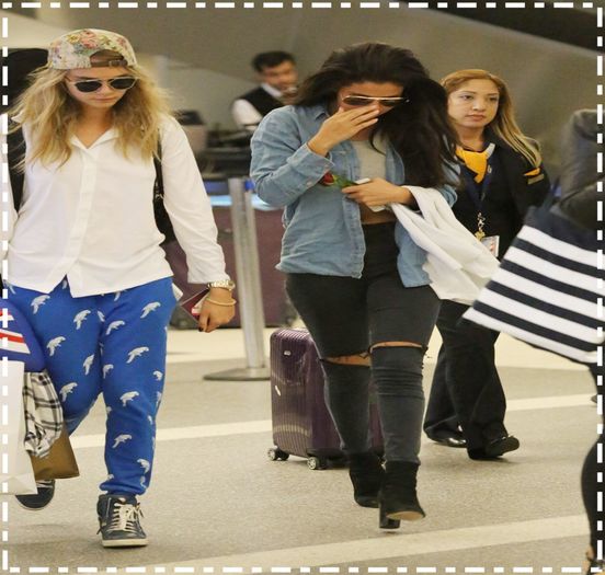  - xz - Arriving -at - LAX - airport - with - Cara -Delevigne -in -Los - A x x x x