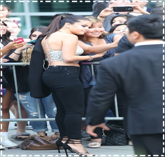  - xz - Arriving - and- meeting - fans -at - the - Behaving - Badly - premiere x