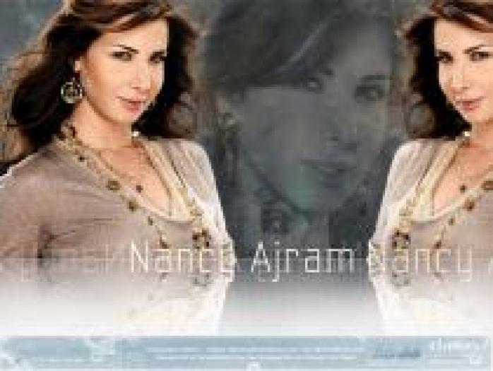 AXJTWMDKTSTTADAINRJ - Nancy Ajram