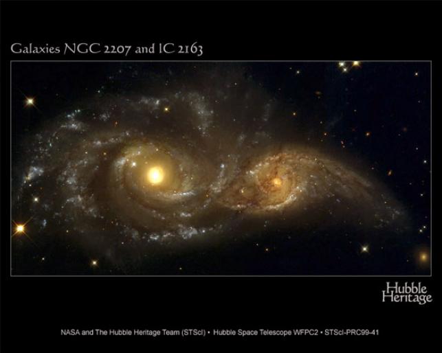 Galaxies NGC 2207 and IC 2163 - Imagini Ezoterice