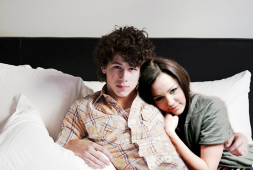 Niley-bed-snuggling-niley-nick-and-miley-3585449-500-336 - miley and nick