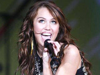 1_61_051208_miley_cyrus3[1] - miley in concerte