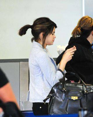 normal_04[1] - Selena Gomez Departing Lax Airport